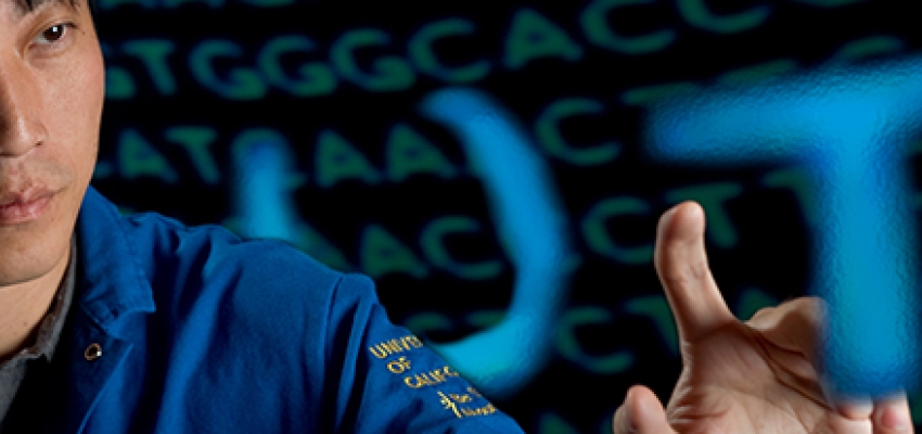image of a man standing in front of DNA letters