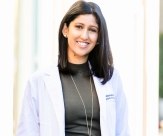 Nidhee Sachdev, MD, in whitecoat