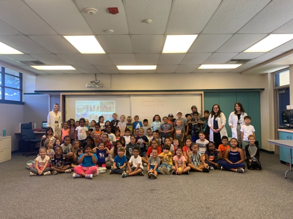 A group picture of elementary students from the Centralia School District and residents from the Family Medicine Residency PRIME-LC program