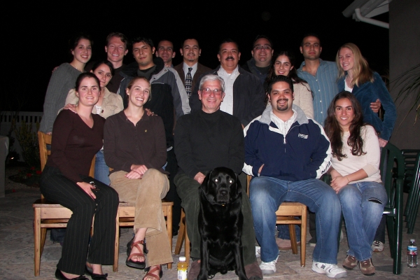 Prime LC Founder Dr. Alberto Manetta (pictured center) with students