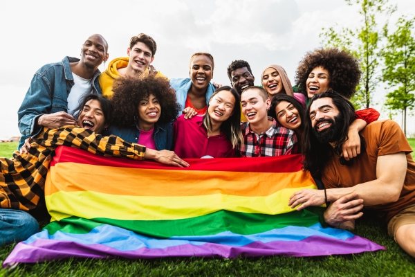 Happy diverse young friends celebrating gay pride festival - LGBTQ community