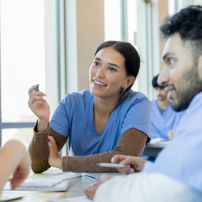 A group of medical students engaging in conversation