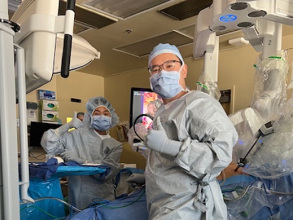 Surgeons performing laparoscopic surgery