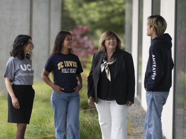 Dean Bernadette Boden-Albala with students from the School of Public Health