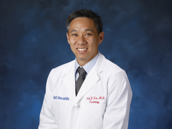 Headshot of Andy Lee in whitecoat. 