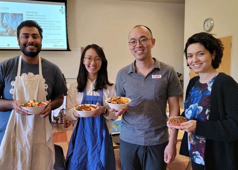 Residents sharpening their skills outside the hospital—learning how to prepare healthy meals so they can better guide patients on nutrition and wellness.