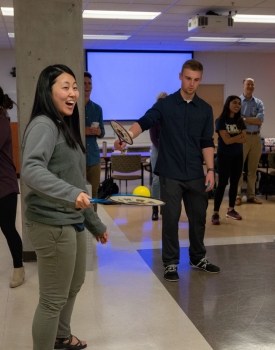 Medical students take a break from their studies to play tai chi tennis.