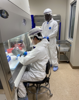 Biosafety professionals working in BSL-3 laboratory