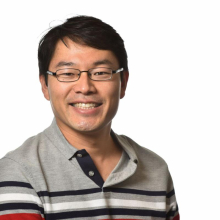 A head shot of Ernesto Nakayasu