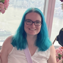 Megan Holmes with blue-colored hair.