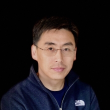 Headshot of Yongsheng Shi in 2024