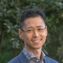 A profile headshot of Stanley Ng