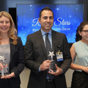 The three recipients of the spring 2024 Rising Stars award, Yarah Haidar, MD, Lindsey Spiegelman, MD, and Areg Grigorian, pose on stage.