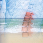 Ocean in background with xray transparent view of the spine