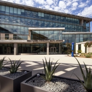 An outdoor view of the Samueli College of Health Sciences building during the day