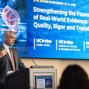 Jay Bhattacharya, director of the National Institutes of Health, speaking on stage at UC Irvine