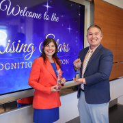 Valery Vilchez Parra, MD, and Edward Kuan, MD, holding their Rising Stars Awards on stage