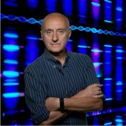 Paolo Sassone-Corsi with genetic image blue background