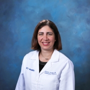 Headshot of Gelareh Sadigh in whitecoat.