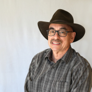 Headshot of Benjamin Handen with a cowboy hat. 