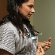 Family physician and PRIME-LC alumna Karla Garcia, MD, MPH, left, talks to patient Gloria Lamadrid de Santana, right, at the San Ysidro Health Center in Chula Vista, California, while medical resident Alondra Cardenas Gonzalez observes. 