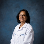 Arti Gupta in whitecoat