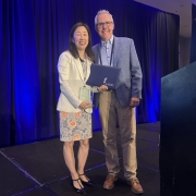 Julie Youm, PhD, accepting GIR award