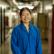 Lara Taniguchi in a blue lab coat