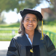 Mahina Mitul in a cap and gown