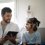 Pediatrician prepares patient for sleep study