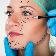 woman face with dotted surgical markings for a facelift surgery