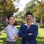 An Do and Robert Krattli stand together outside