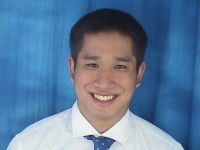 A profile headshot of Bryston Chang