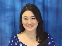 A profile headshot of Jenni Choi