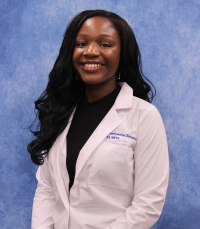 Headshot of Ozivefueshe Dimow, Radiology resident, in white coat