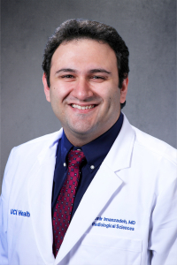 Amir Imanzadeh headshot with gray background