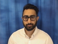 A profile headshot of Mohammed Malik