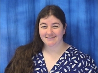 A profile headshot of Kara Mossler