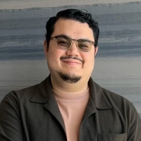 A profile headshot of Rudy Cheong