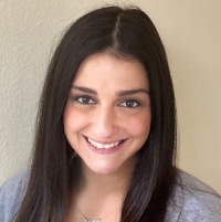 A headshot photo of Sarine Dadourian