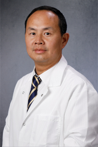 Liangzhong Xiang headshot with gray background