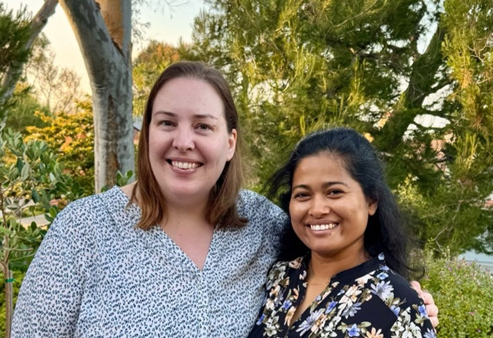 Lisa Wagar, PhD and Mahina Mitul, PhD, stand together outside. Below the photo reads “UC Irvine Researchers.”