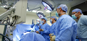 Edward Kuan performing surgery