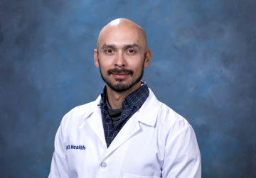 Michael Lopez in whitecoat