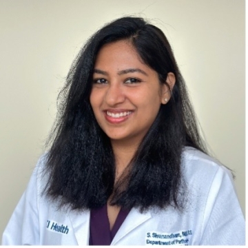 Sindhuja Sivanandham, MD, in whitecoat